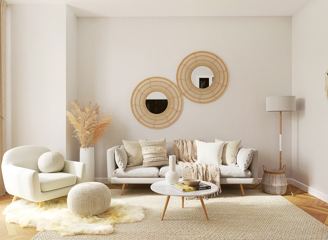 a-living-room-filled-with-furniture-and-a-mirror-c0jor-2x3e